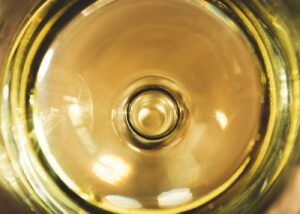 close up of a glass of white wine from birds eye view